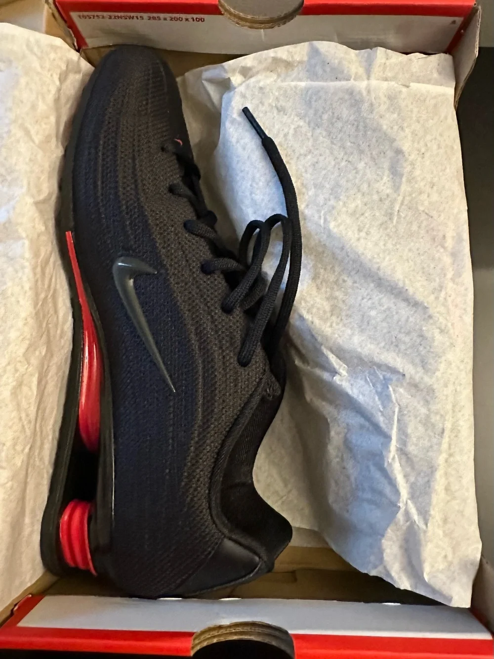 Nike Black Sneakers with Red Highlights